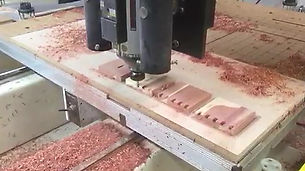 CNC wood router creating dovetails 